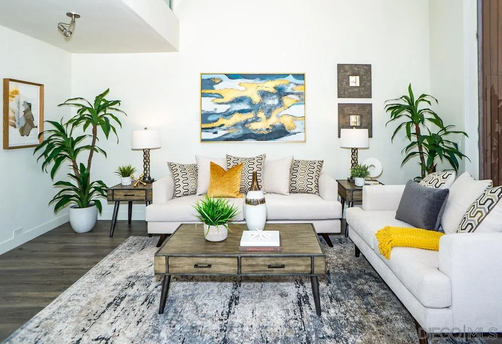 2630 Torrey Pines Road, Unit E22 La Jolla, CA 92037 - Photo 3 of 37 a living room with furniture potted plant and a table