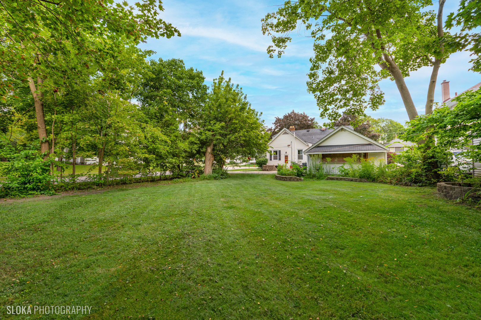 1044 Prospect Street Elgin, IL 60120 - Photo 20 of 21 a view of house with garden