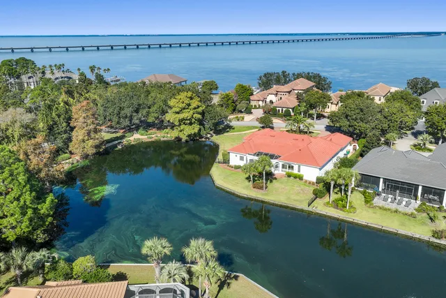 a bedroom with bed and window