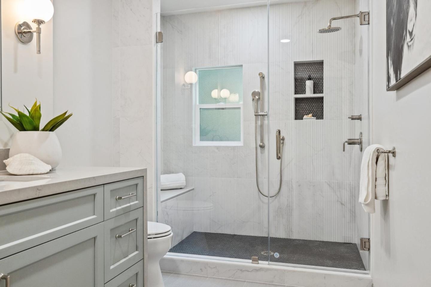 961 Berkeley Avenue Menlo Park, CA 94025 - Photo 20 of 27 a bathroom with a shower a toilet and a sink
