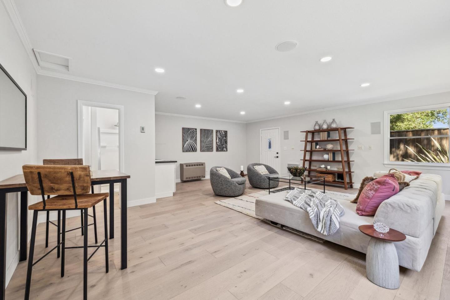 961 Berkeley Avenue Menlo Park, CA 94025 - Photo 24 of 27 a bedroom with furniture and a wooden floor