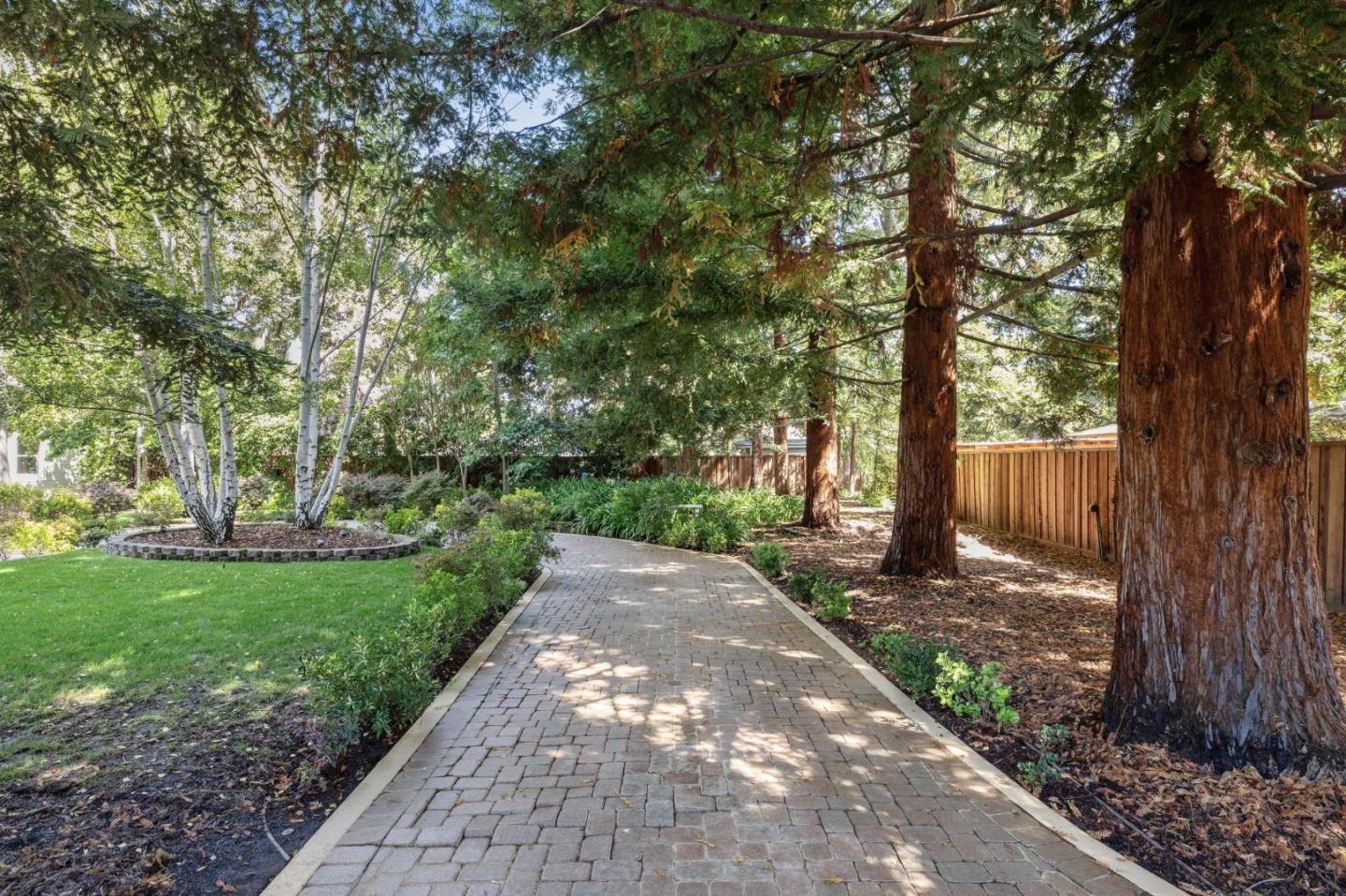 961 Berkeley Avenue Menlo Park, CA 94025 - Photo 3 of 27 a view of a park with large trees