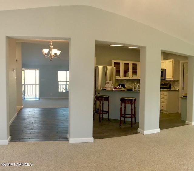 2553 Hilltop Road Prescott, AZ 86301 - Photo 14 of 35 FAMILY ROOM VIEWS TOWARDS KITCHEN & LIVI