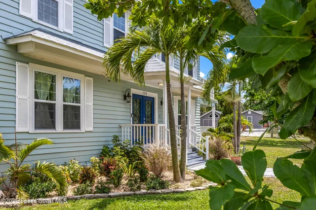 a view of a potted plants on a balcony