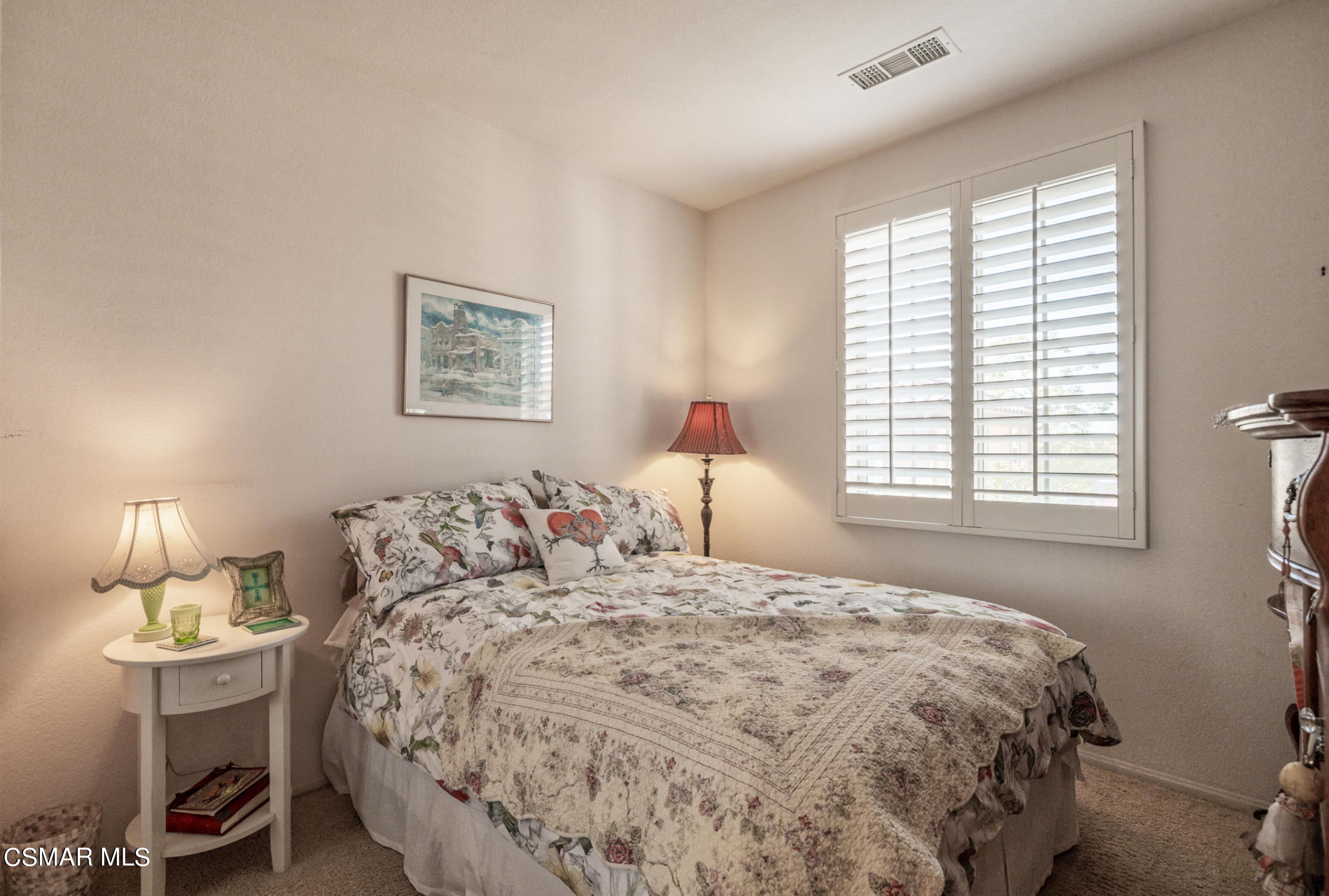 6825 Simmons Way Moorpark, CA 93021 - Photo 16 of 24 a bedroom with a bed and a window