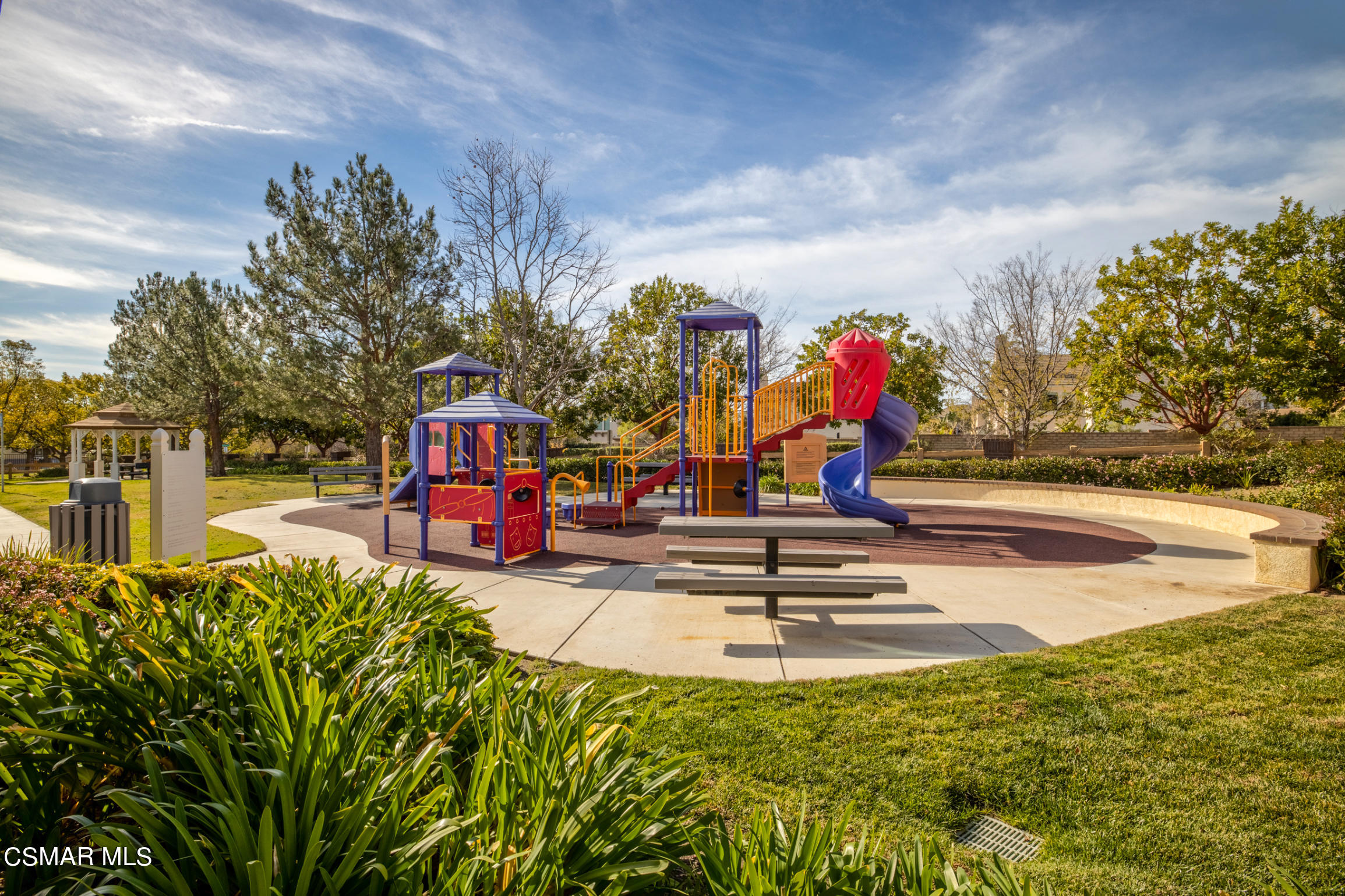 6825 Simmons Way Moorpark, CA 93021 - Photo 20 of 24 a view of a park with swings and slides