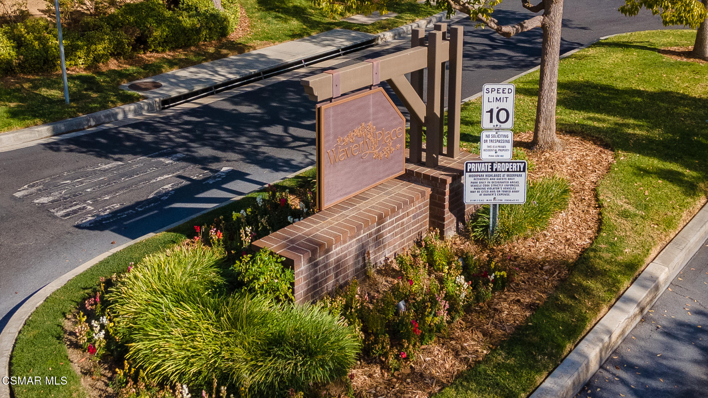 6825 Simmons Way Moorpark, CA 93021 - Photo 24 of 24 a view of a house with a flower garden