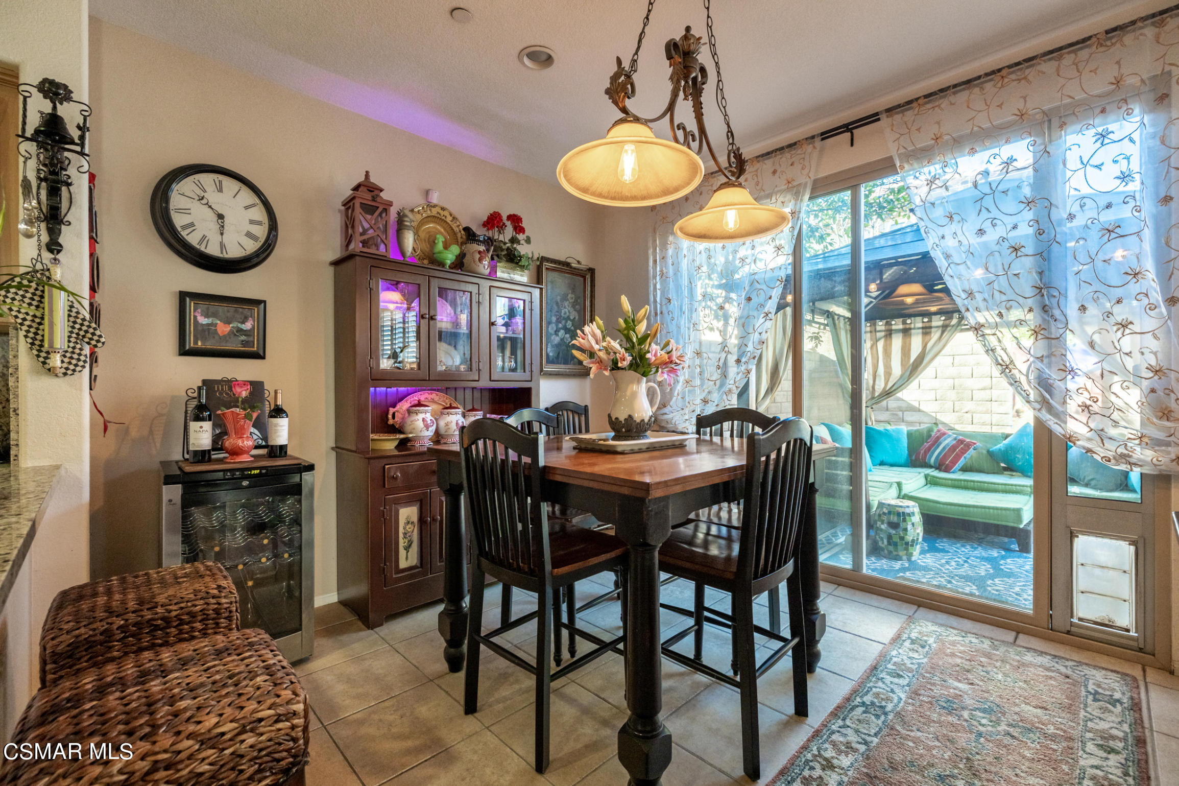 6825 Simmons Way Moorpark, CA 93021 - Photo 6 of 24 a view of a dining room with furniture window and outside view