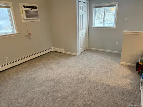 an empty room with windows