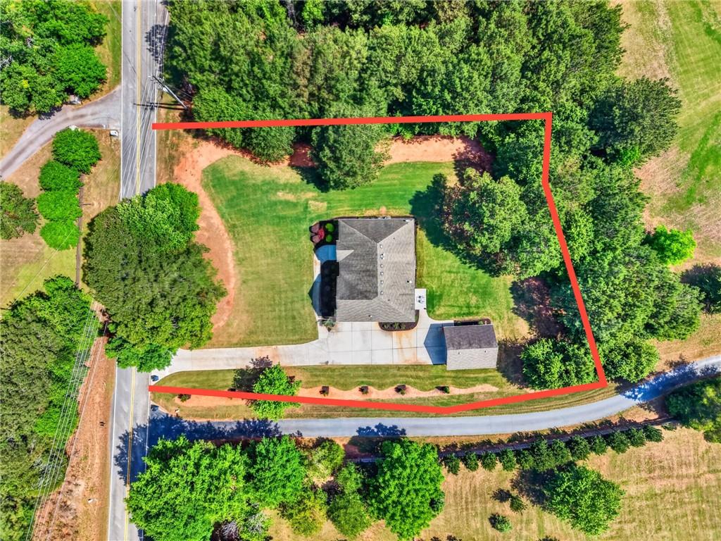 2300 Tucker Mill Road Southwest Conyers, GA 30094 - Photo 44 of 45 an aerial view of a house with an outdoor space