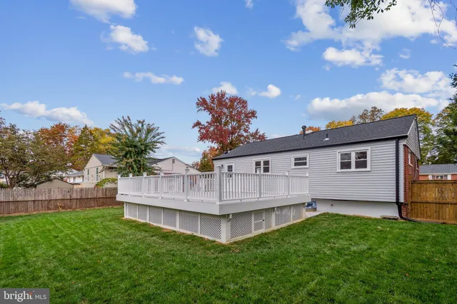 a view of front of house with a yard