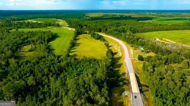 a view of a lake with a city