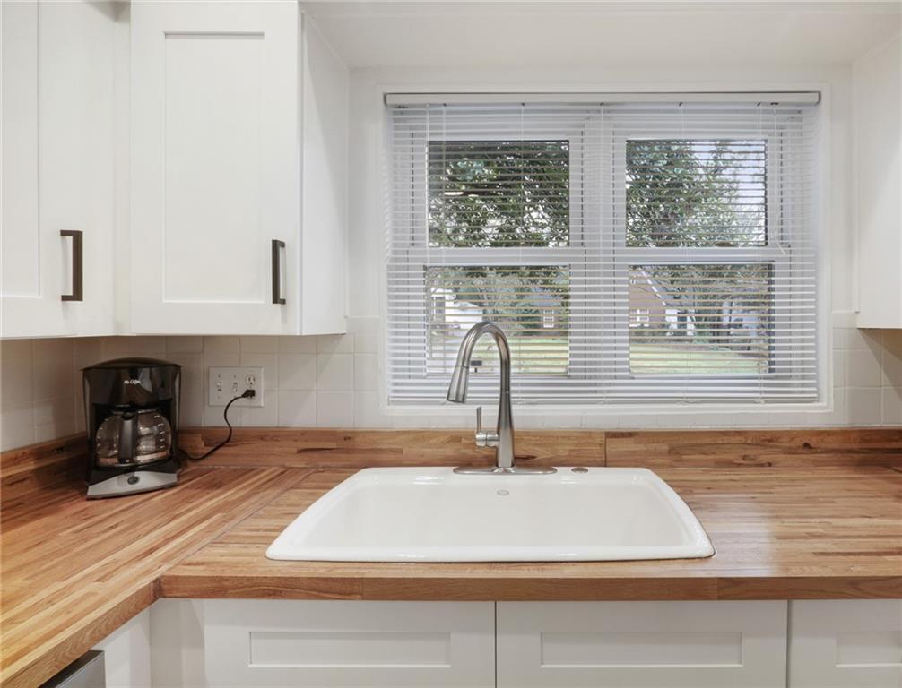 961 East Rock Springs Road Northeast, Unit MODERN Atlanta, GA 30306 - Photo 16 of 47 a kitchen with a sink and a window