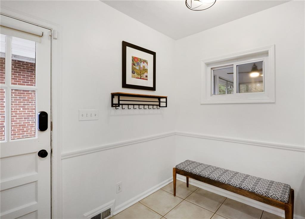 961 East Rock Springs Road Northeast, Unit MODERN Atlanta, GA 30306 - Photo 19 of 47 a bathroom with a bathtub and a shower