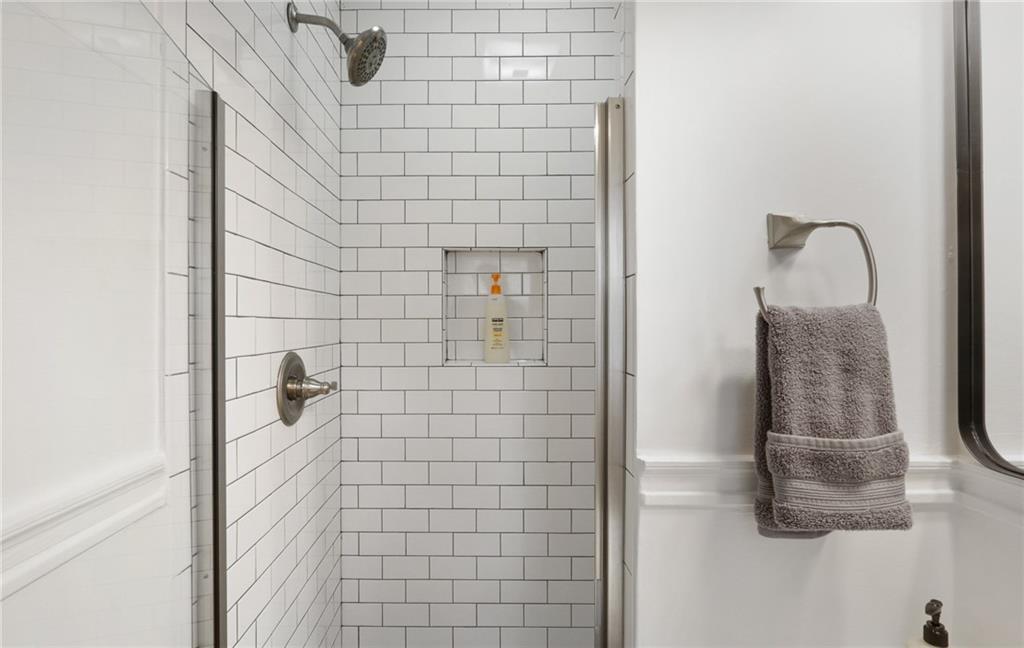 961 East Rock Springs Road Northeast, Unit MODERN Atlanta, GA 30306 - Photo 27 of 47 a bathroom with a shower