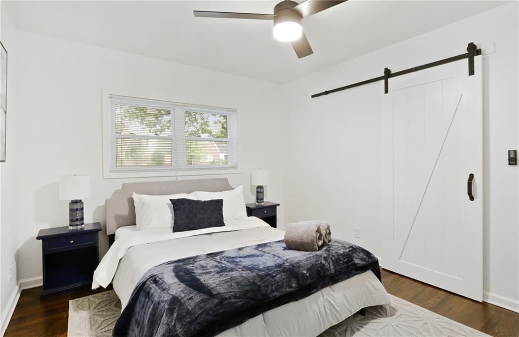 961 East Rock Springs Road Northeast, Unit MODERN Atlanta, GA 30306 - Photo 29 of 47 a bedroom with a bed and a window