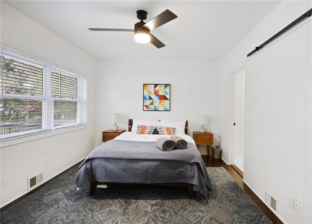 961 East Rock Springs Road Northeast, Unit MODERN Atlanta, GA 30306 - Photo 32 of 47 a bedroom with bed and a window