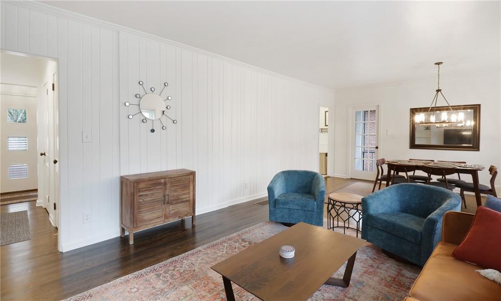 961 East Rock Springs Road Northeast, Unit MODERN Atlanta, GA 30306 - Photo 4 of 47 a living room with furniture and wooden floor