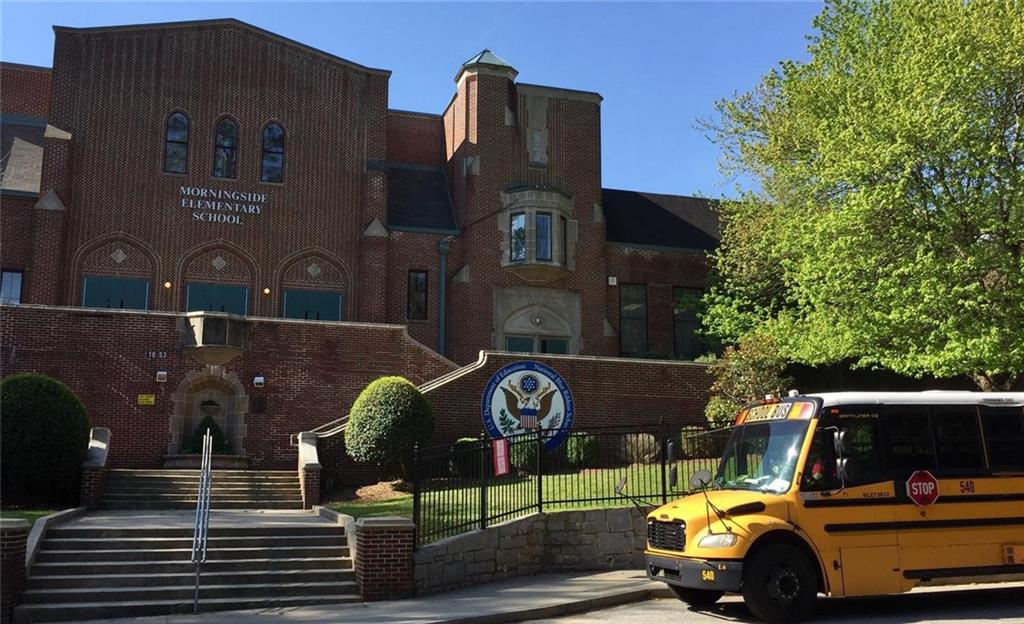961 East Rock Springs Road Northeast, Unit MODERN Atlanta, GA 30306 - Photo 46 of 47 a view of a car parked in front of a building
