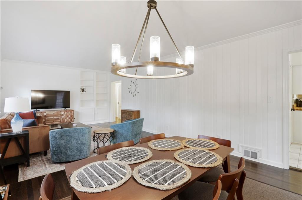 961 East Rock Springs Road Northeast, Unit MODERN Atlanta, GA 30306 - Photo 7 of 47 a view of a livingroom with furniture and a flat screen tv