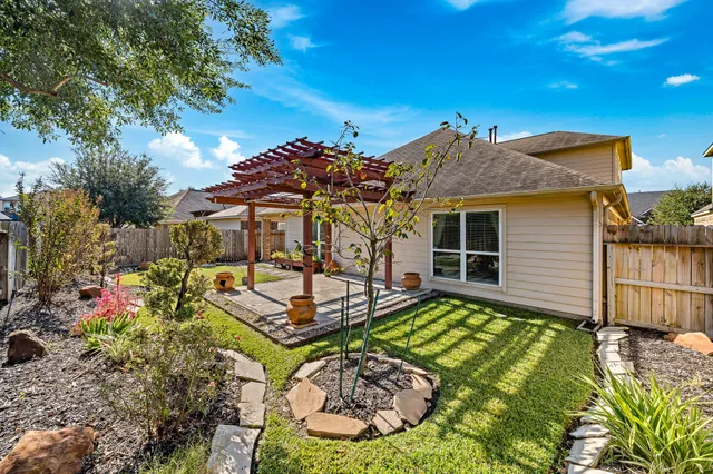 front view of a house with a patio