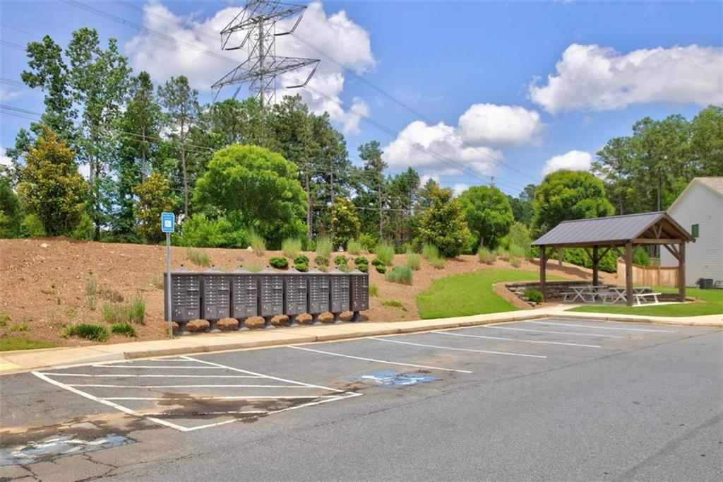 107 Ledgemont Way Acworth, GA 30101 - Photo 53 of 57 a view of a house with a swimming pool and a yard