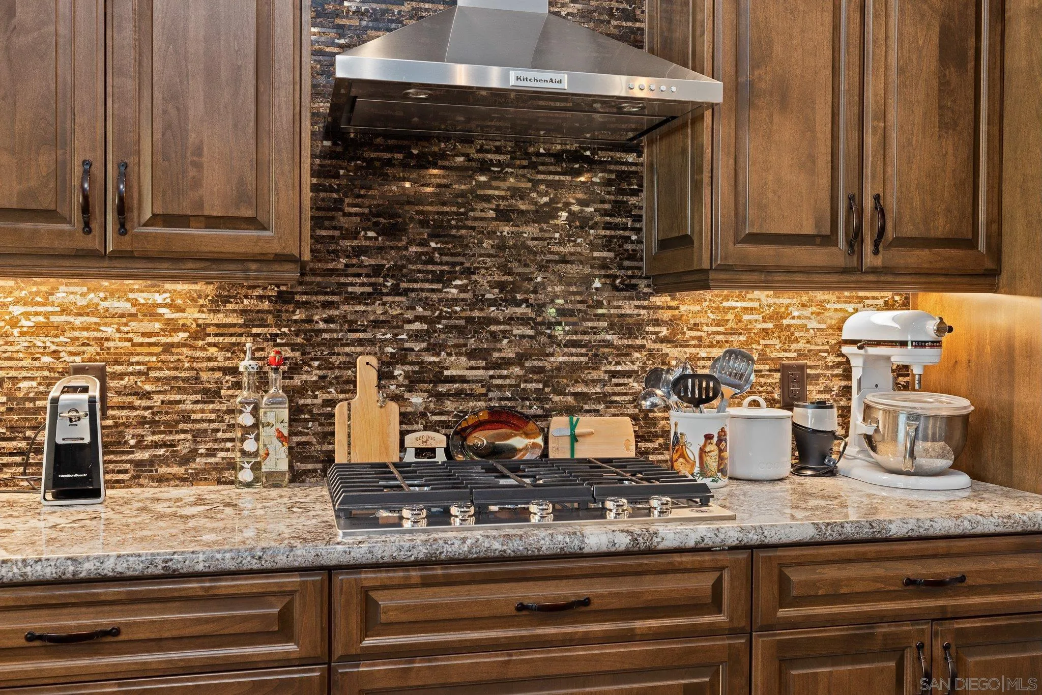 19553 Hidden Glen Road Alpine, CA 91901 - Photo 11 of 55 a kitchen with granite countertop a sink and cabinets