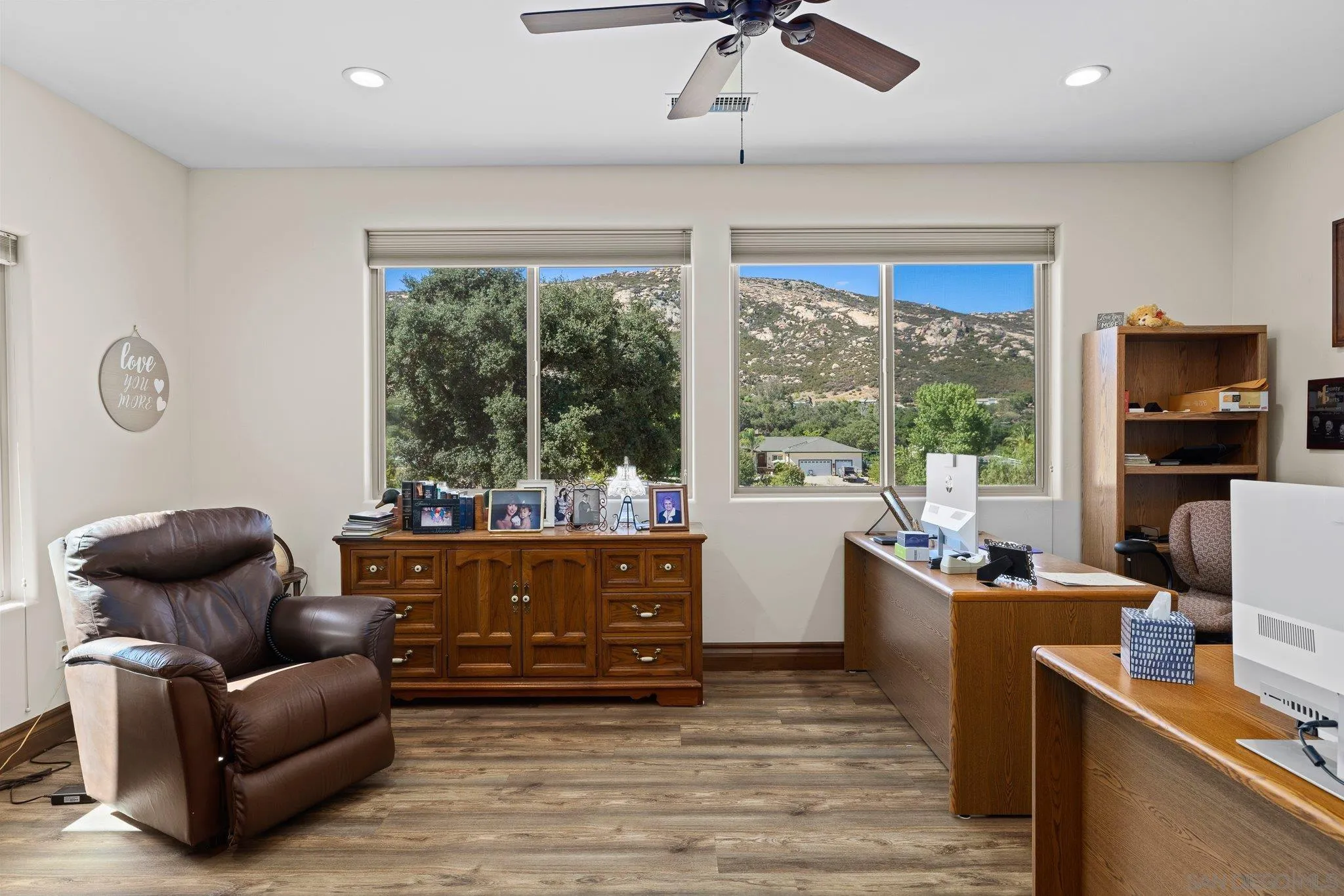 19553 Hidden Glen Road Alpine, CA 91901 - Photo 21 of 55 a living room with furniture and a flat screen tv