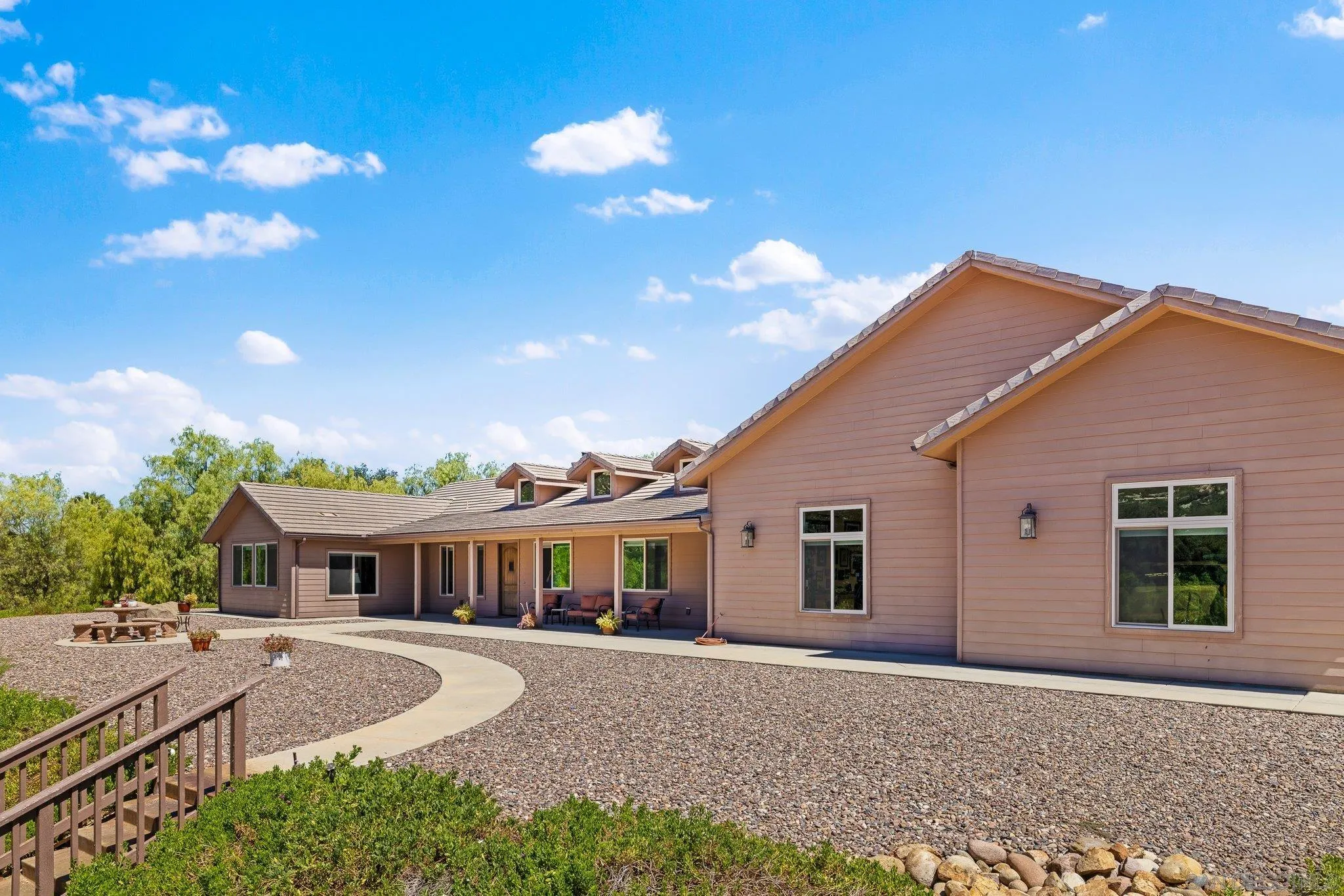 19553 Hidden Glen Road Alpine, CA 91901 - Photo 40 of 55 a front view of a house with garden