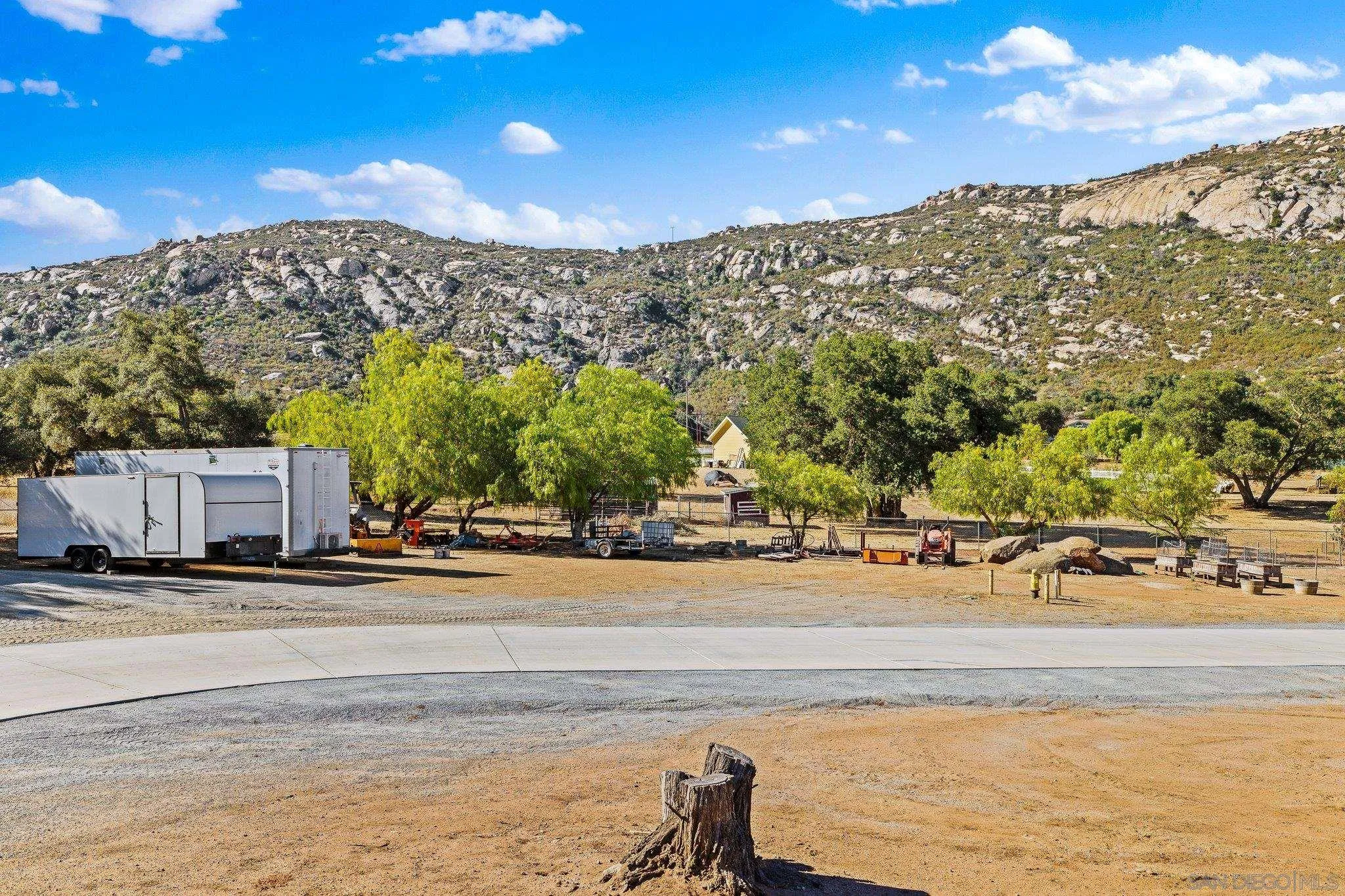 19553 Hidden Glen Road Alpine, CA 91901 - Photo 41 of 55 a view of a house with a street