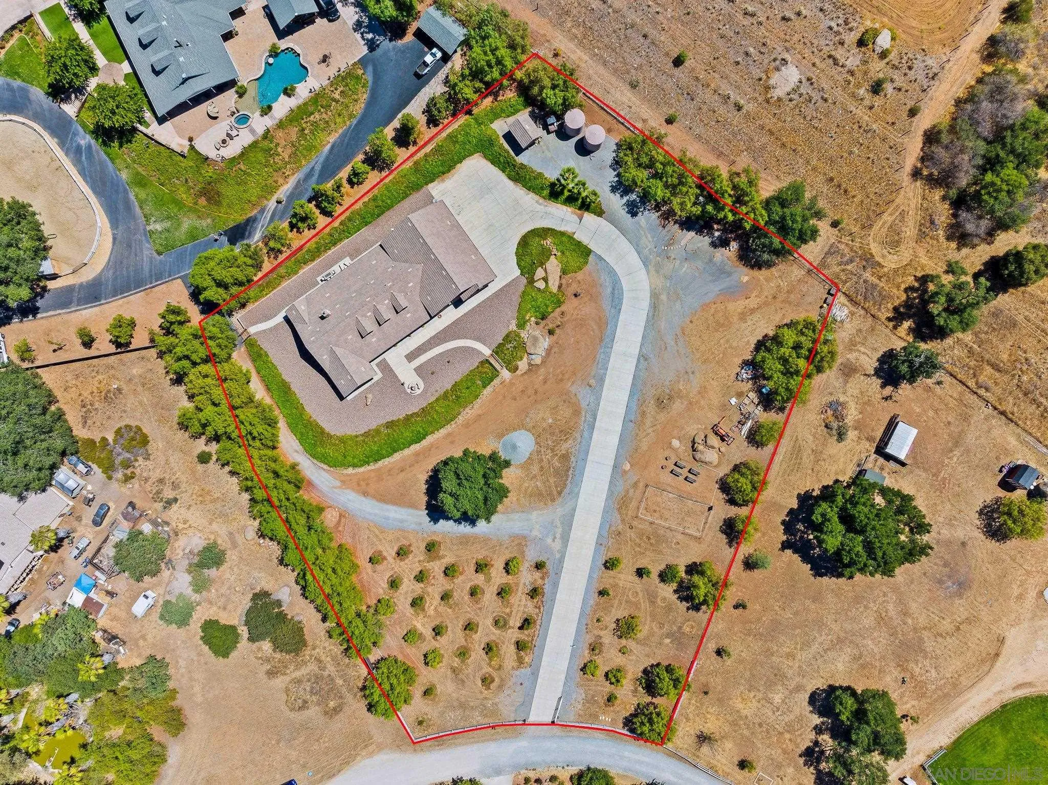 19553 Hidden Glen Road Alpine, CA 91901 - Photo 53 of 55 an aerial view of a house with a swimming pool