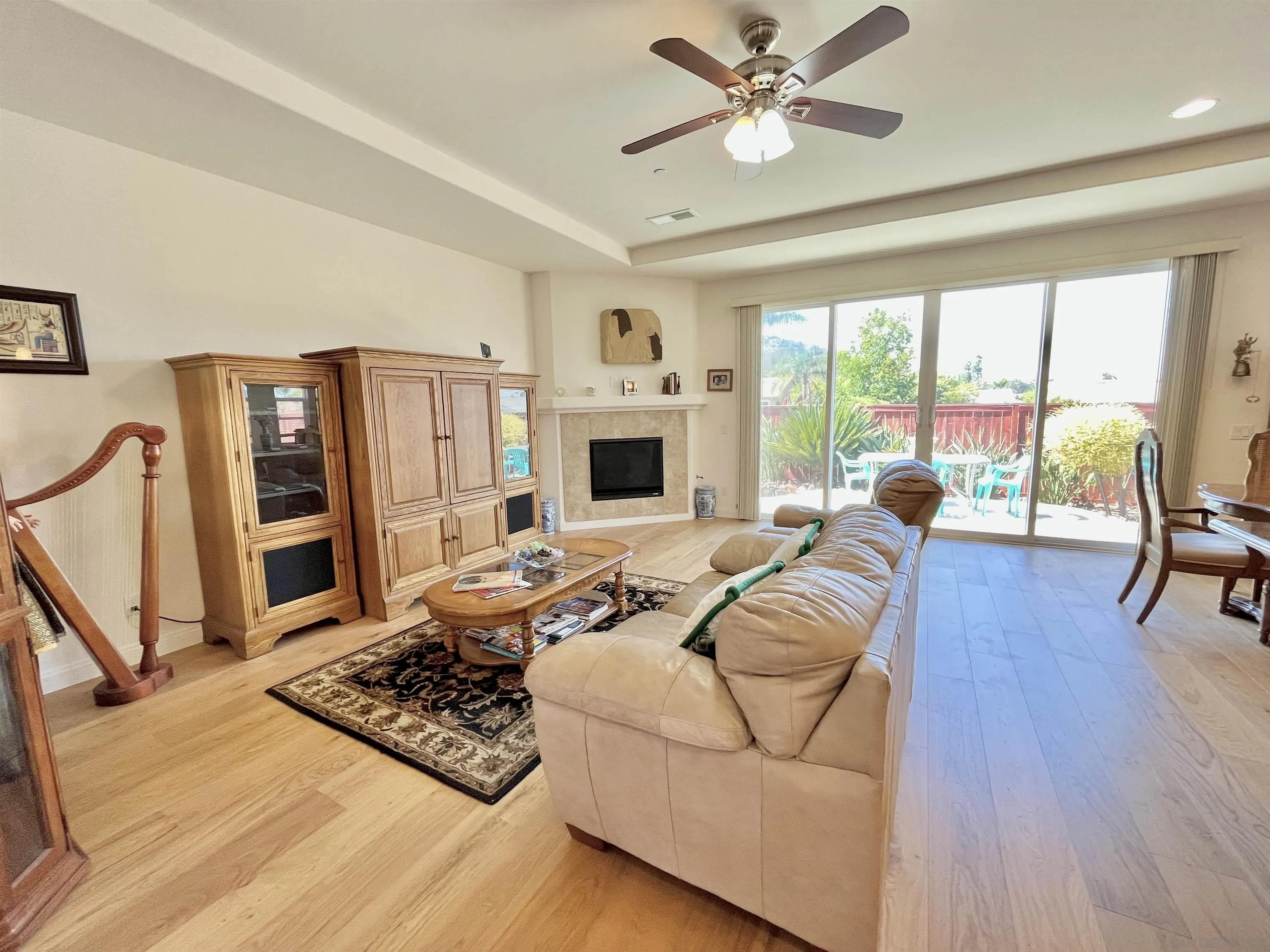 888 Rancho Terrace Ct. El Cajon, CA 92019 - Photo 16 of 34 a living room with furniture fireplace and a large window