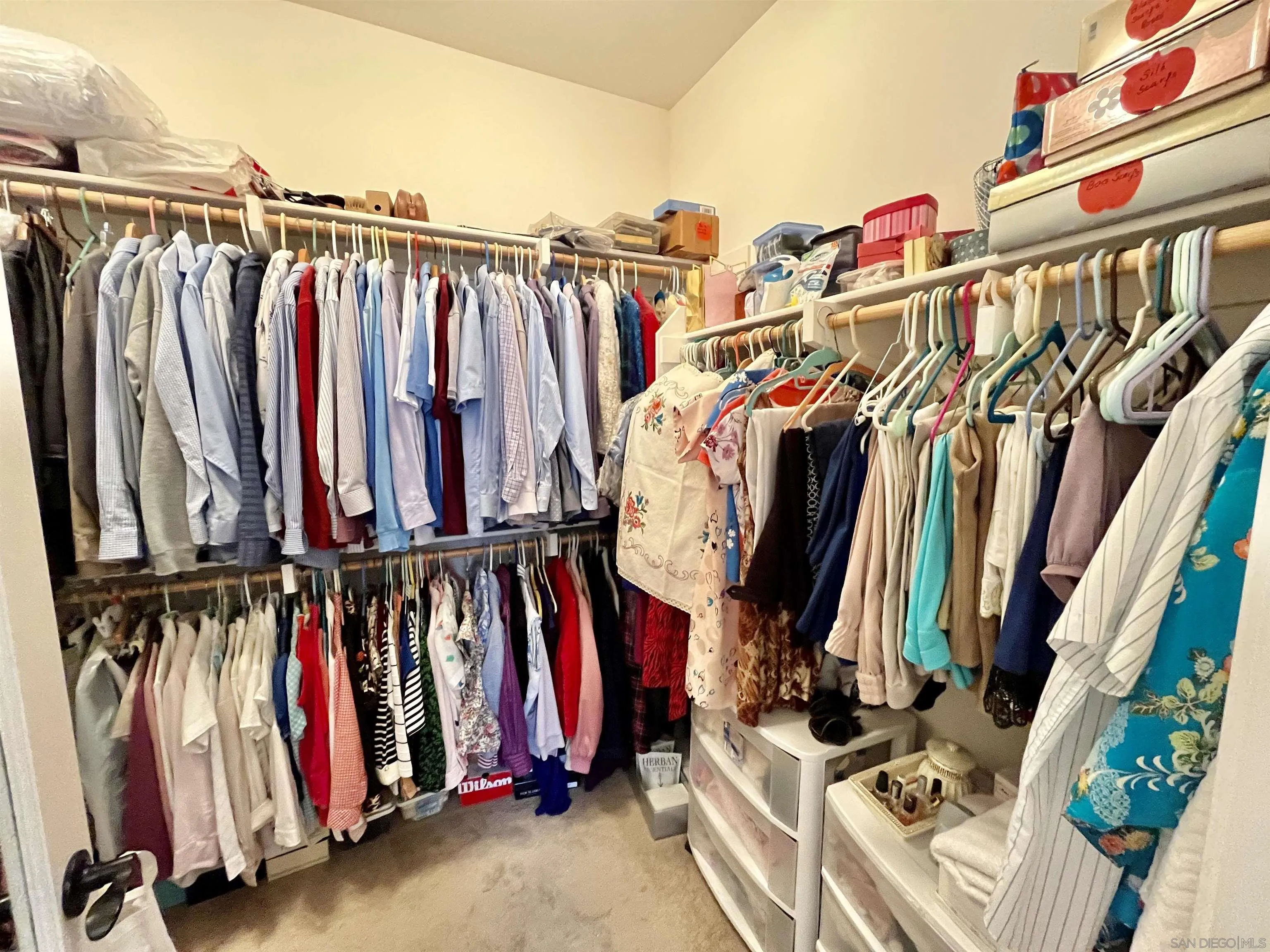 888 Rancho Terrace Ct. El Cajon, CA 92019 - Photo 25 of 34 a view of walk in closet with clothes
