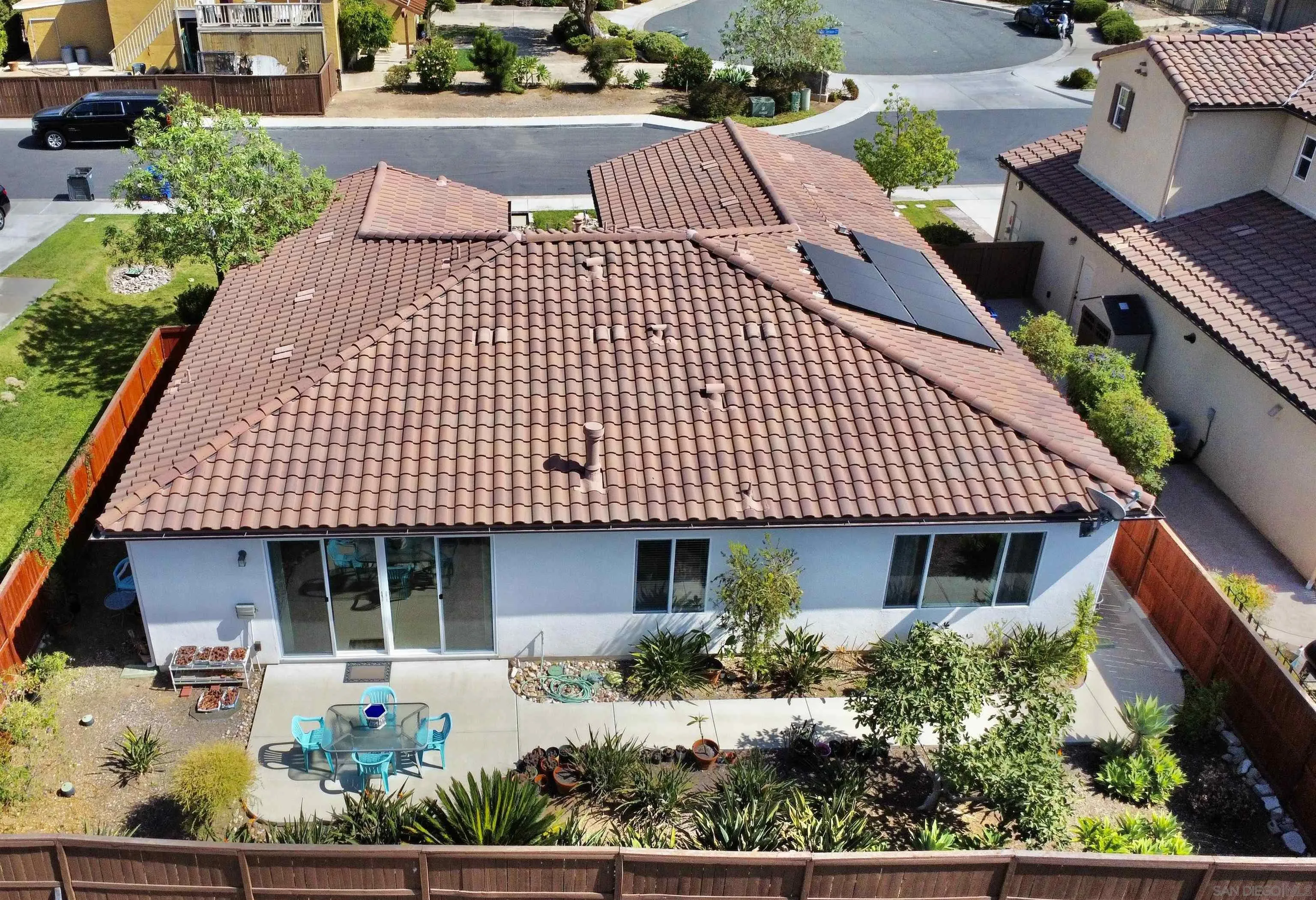 888 Rancho Terrace Ct. El Cajon, CA 92019 - Photo 3 of 34 a front view of a house with a garden