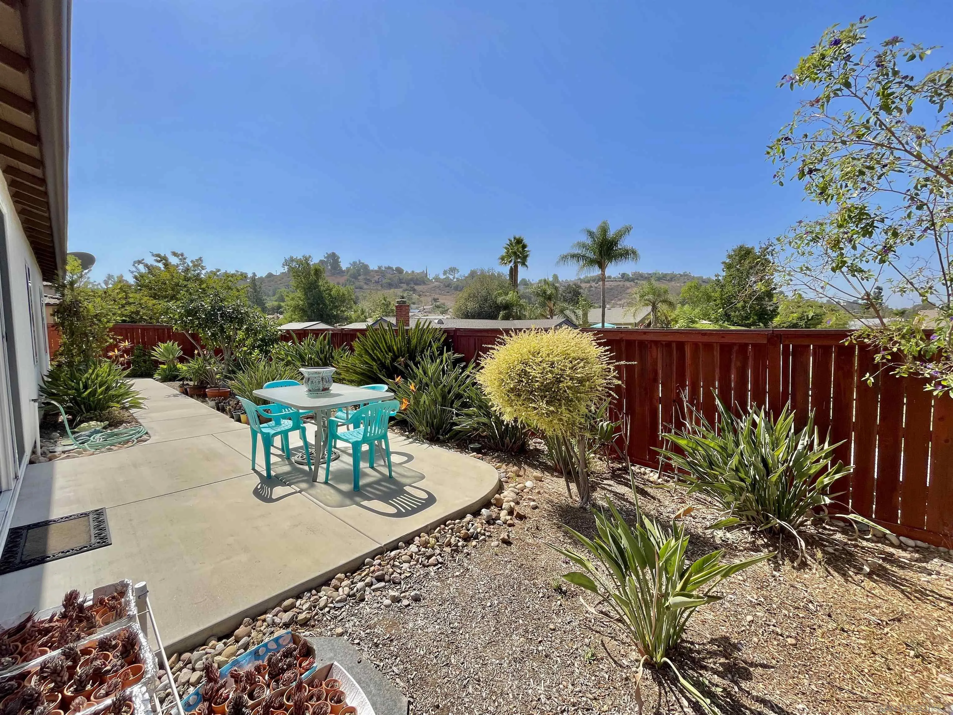 888 Rancho Terrace Ct. El Cajon, CA 92019 - Photo 31 of 34 a view of a backyard with sitting area