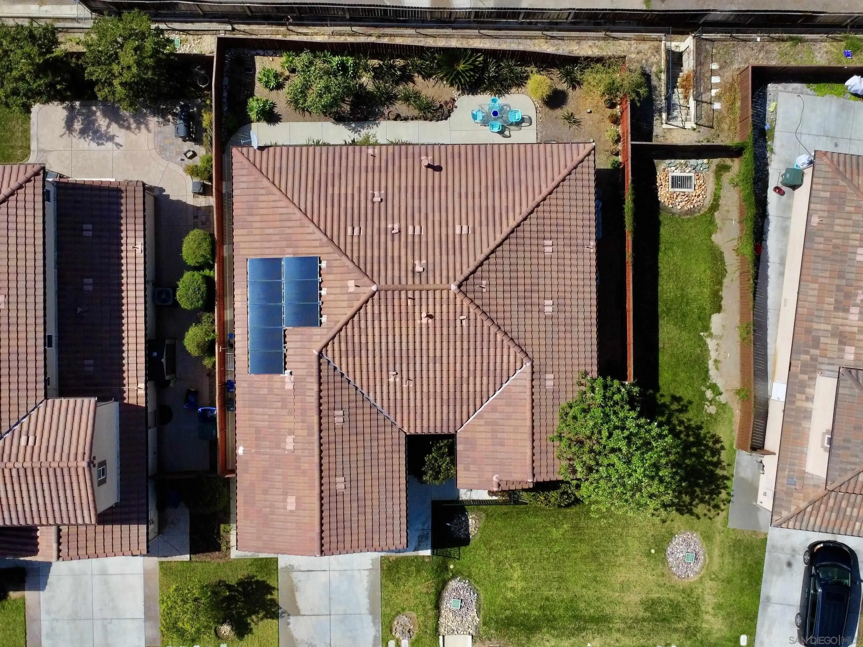 888 Rancho Terrace Ct. El Cajon, CA 92019 - Photo 4 of 34 a front view of a house with a garden