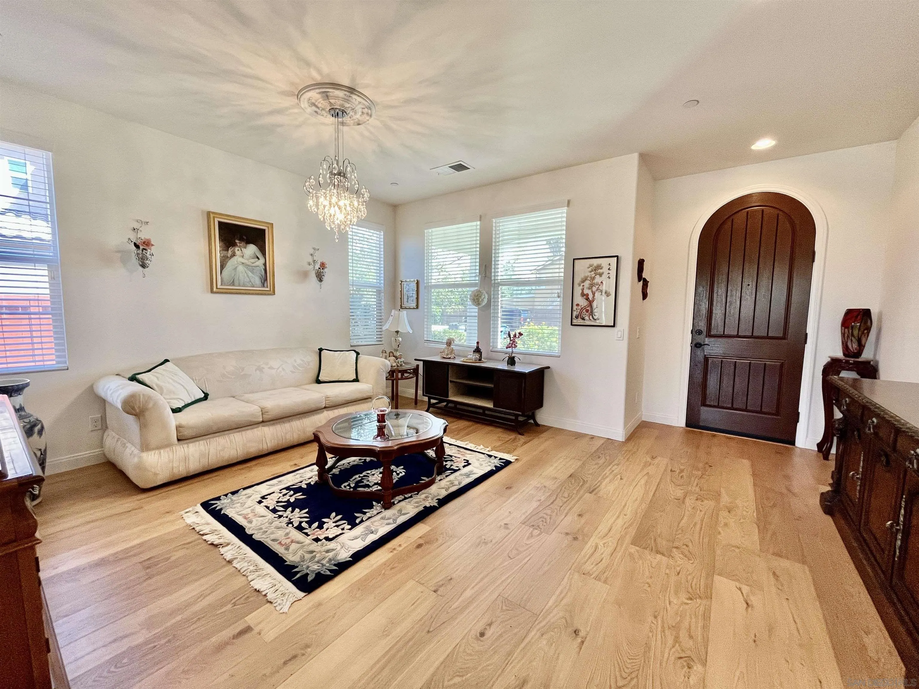 888 Rancho Terrace Ct. El Cajon, CA 92019 - Photo 8 of 34 a living room with furniture and a wooden floor