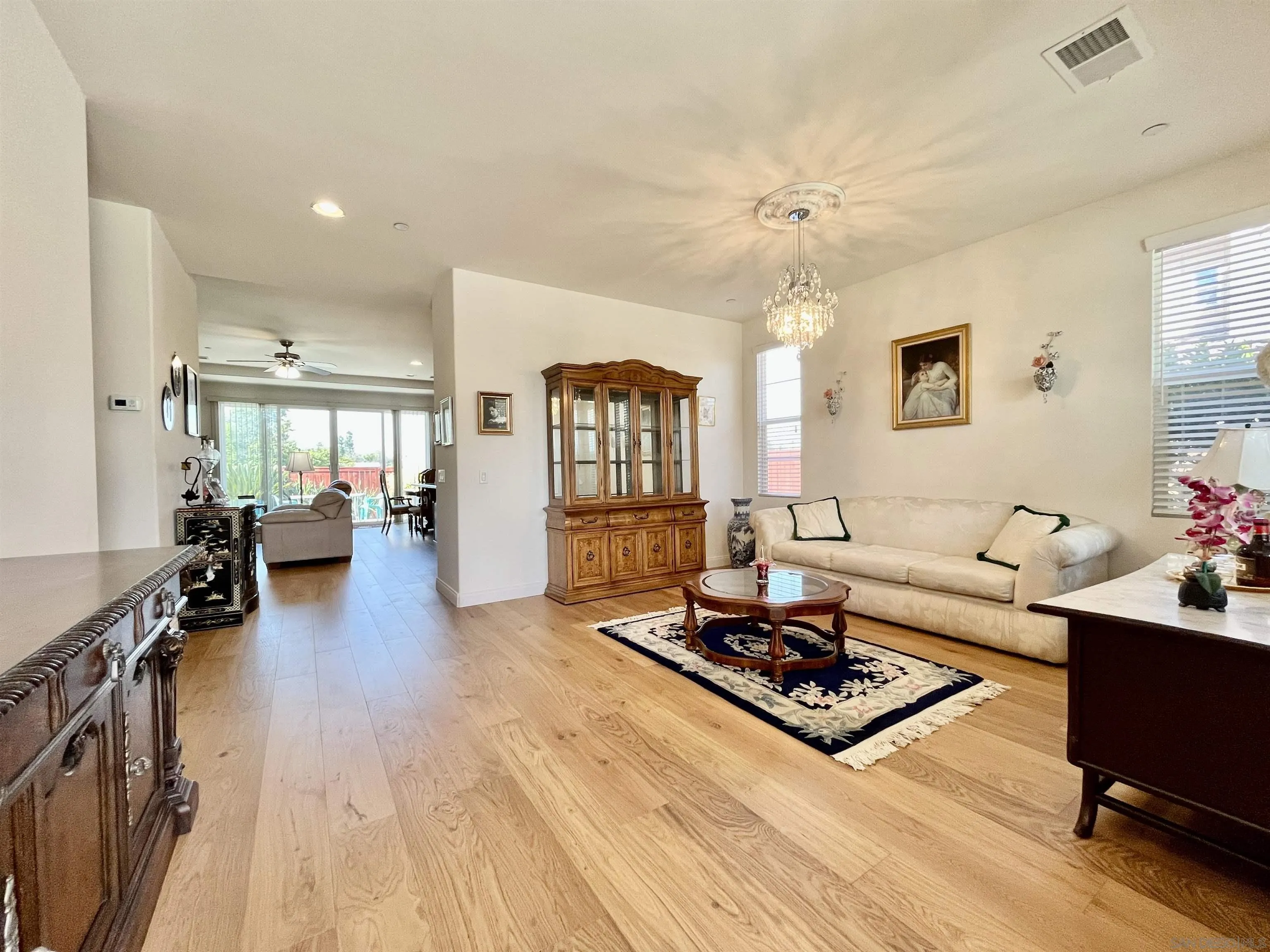 888 Rancho Terrace Ct. El Cajon, CA 92019 - Photo 10 of 34 a living room with furniture and a wooden floor