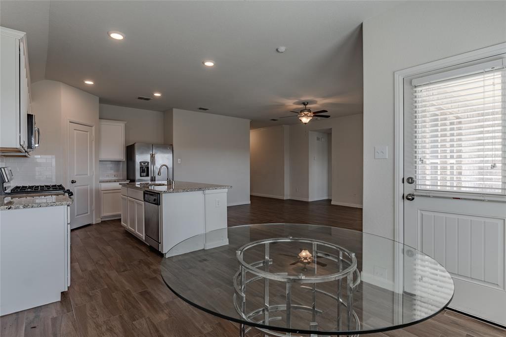 240 Copper Switch Drive Anna, TX 75409 - Photo 19 of 33 Kitchen with a ceiling fan, tasteful backsplash, dark wood-type flooring, and recessed lighting