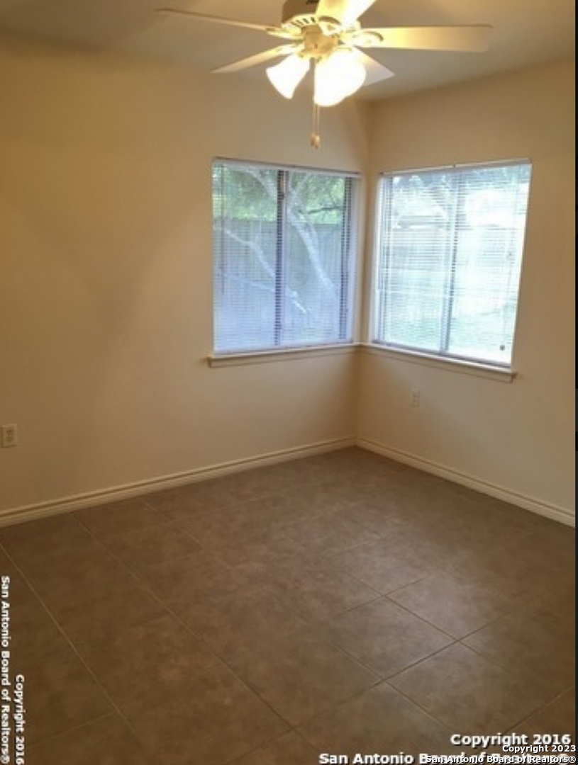 16619 Crested Butte Street San Antonio, TX 78247 - Photo 5 of 5 a view of an empty room with a window