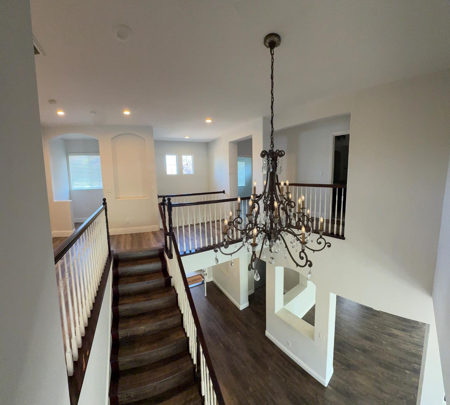 11816 Spring Walk Way Rancho Cordova, CA 95742 - Photo 21 of 36 a view of entryway and hall with wooden floor
