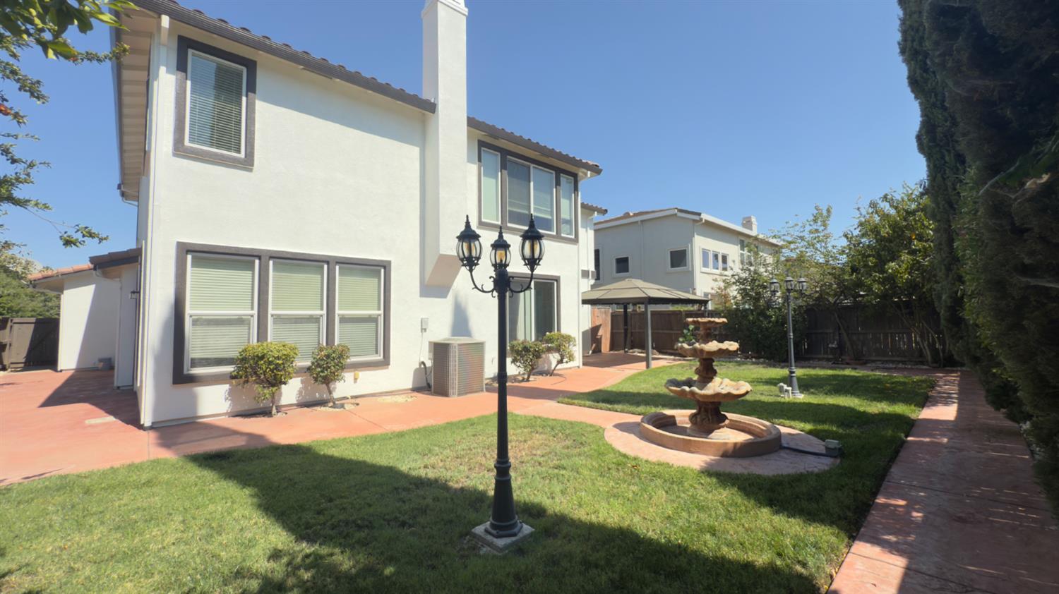 11816 Spring Walk Way Rancho Cordova, CA 95742 - Photo 34 of 36 a view of a house with backyard