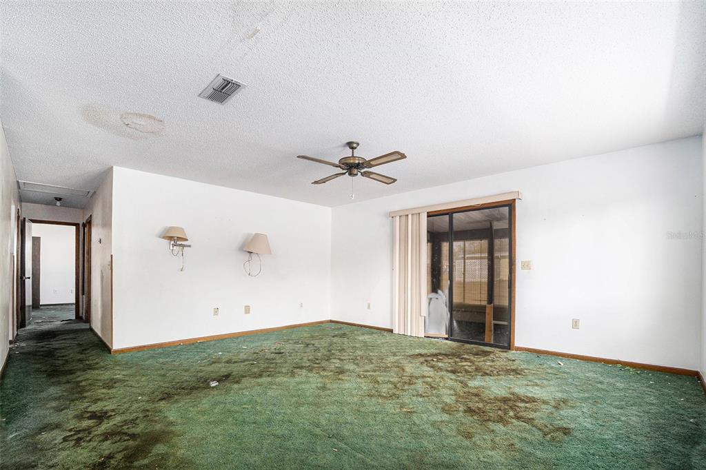 10080 Southwest 99th Avenue Ocala, FL 34481 - Photo 14 of 15 an empty room with closet and windows