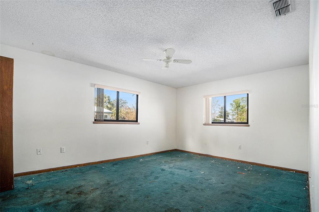 10080 Southwest 99th Avenue Ocala, FL 34481 - Photo 10 of 15 a view of an empty room with a window