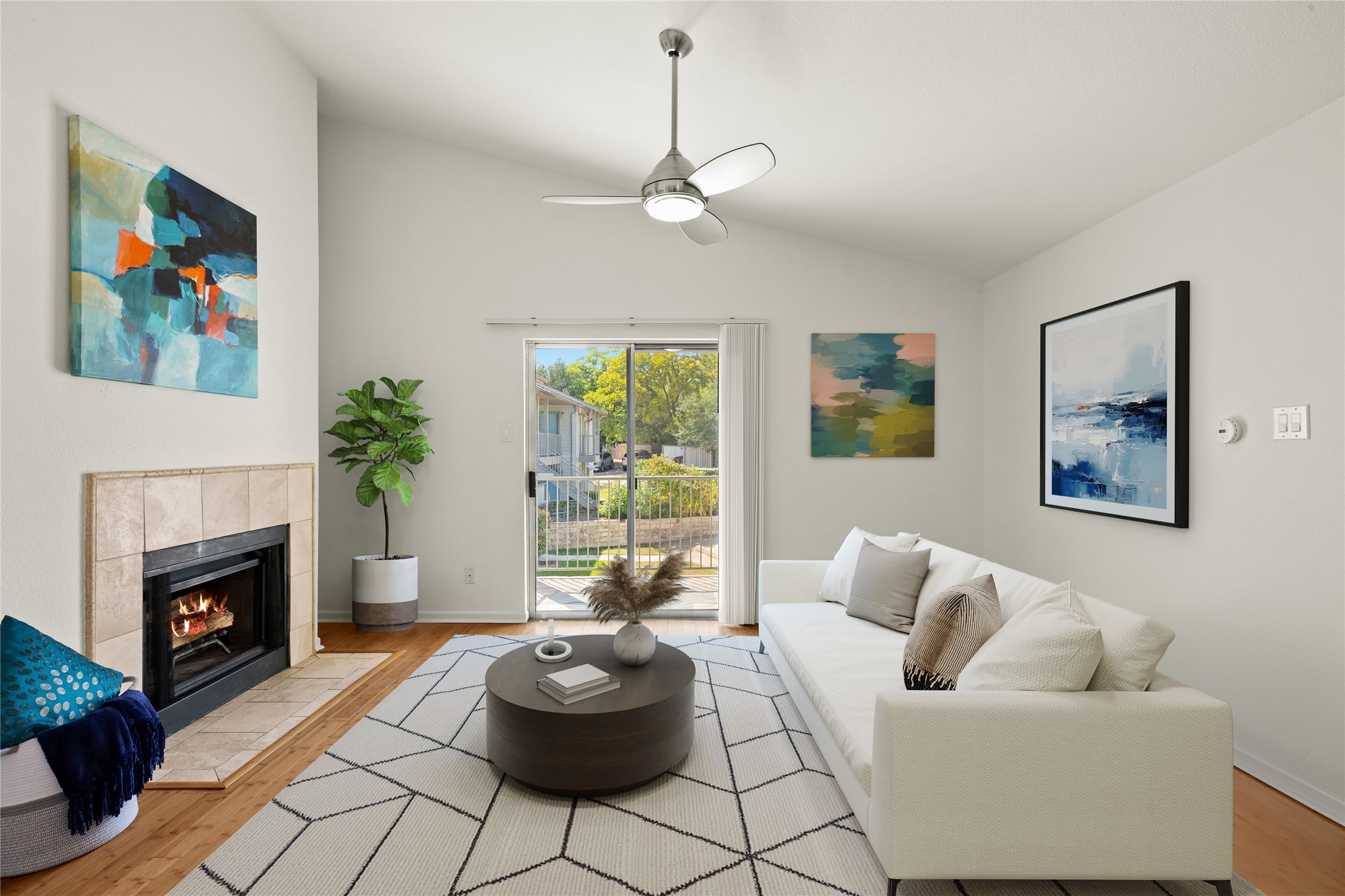 3204 Menchaca Road, Unit 216 Austin, TX 78704 - Photo 1 of 1 a living room with furniture and a fireplace