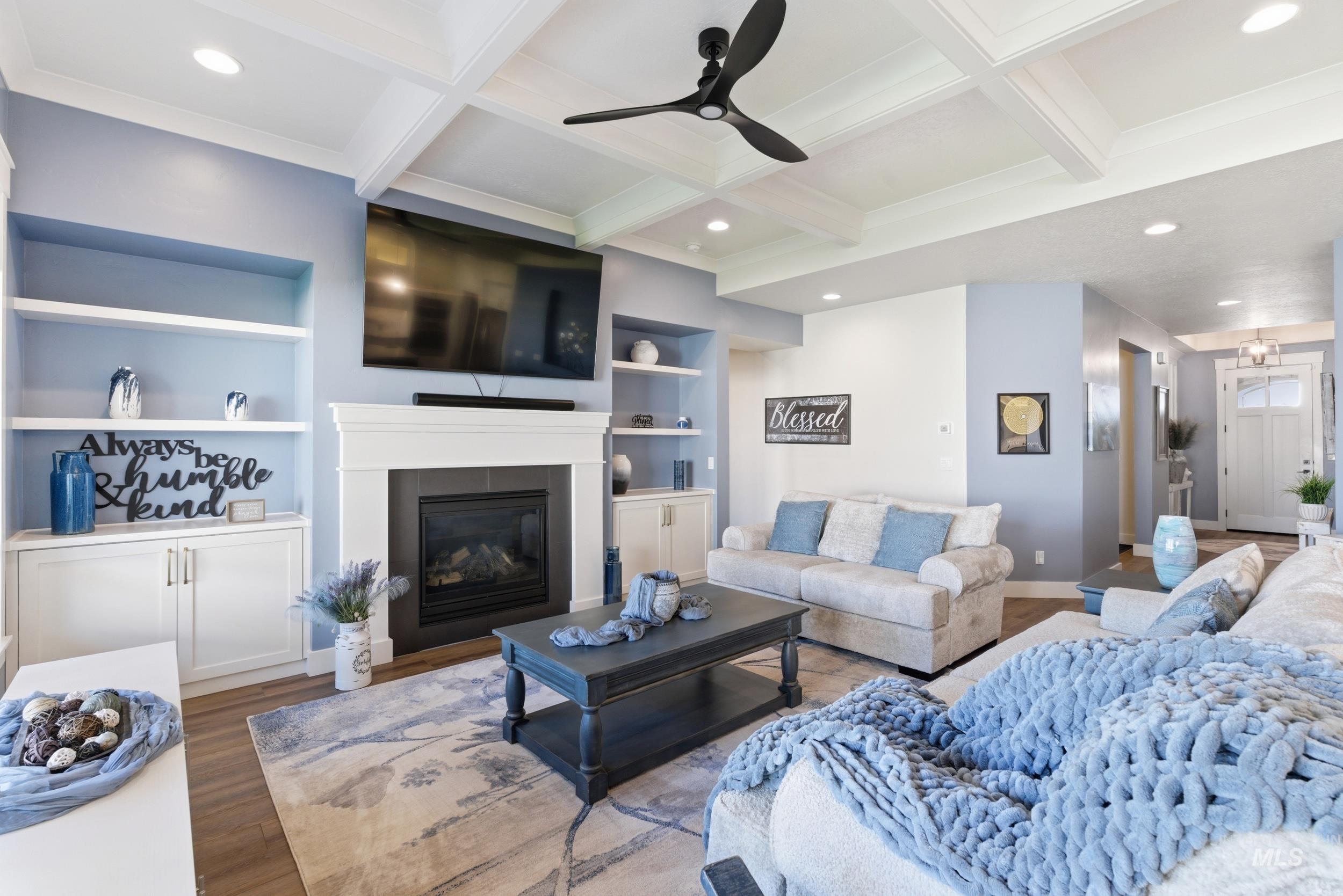 6347 South Utmost Lane Meridian, ID 83642 - Photo 15 of 37 Living area featuring a coffered ceiling with recessed lighting and a ceiling fan