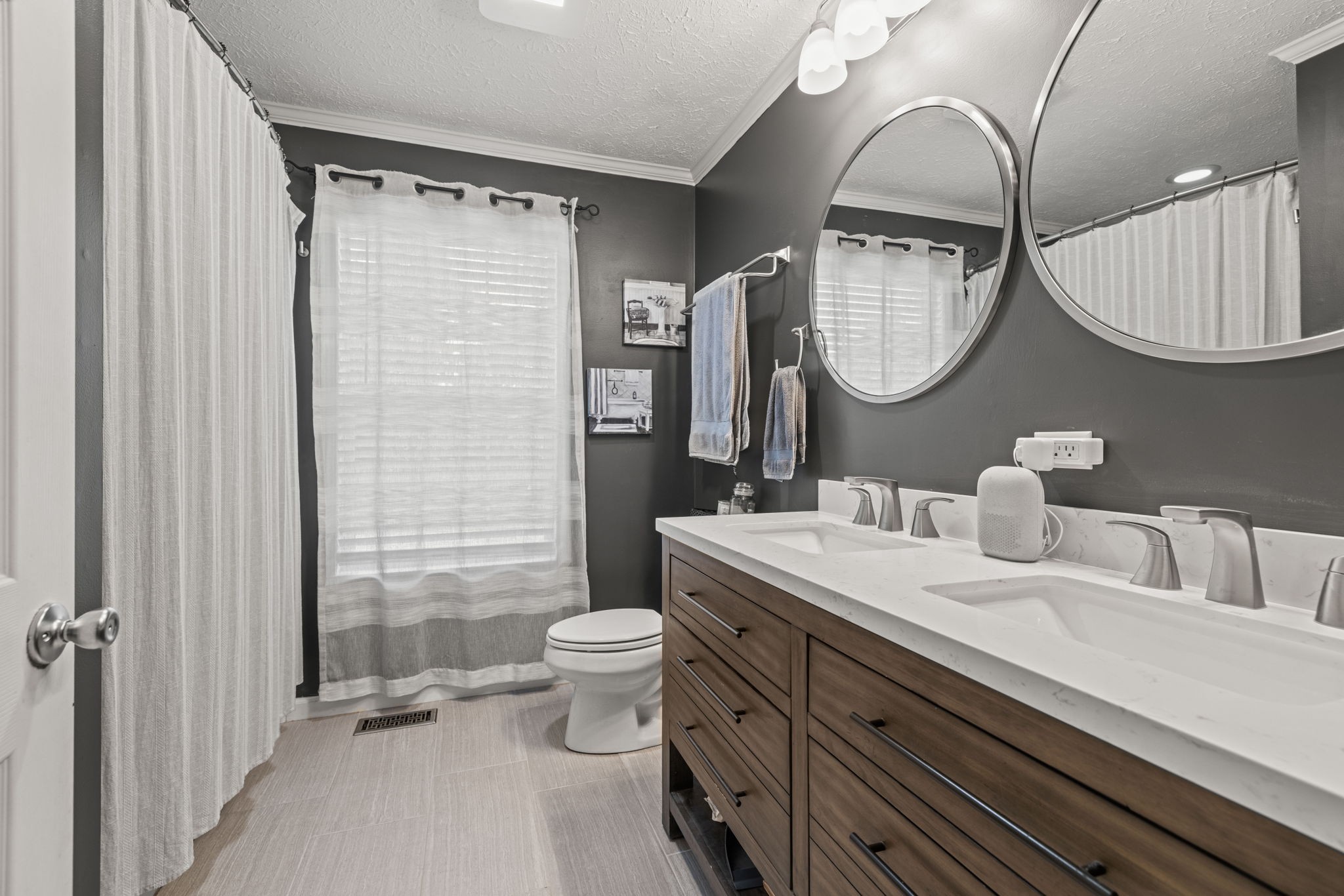 1154 Wrights Mill Road Spring Hill, TN 37174 - Photo 20 of 38 a bathroom with a toilet a sink and mirror