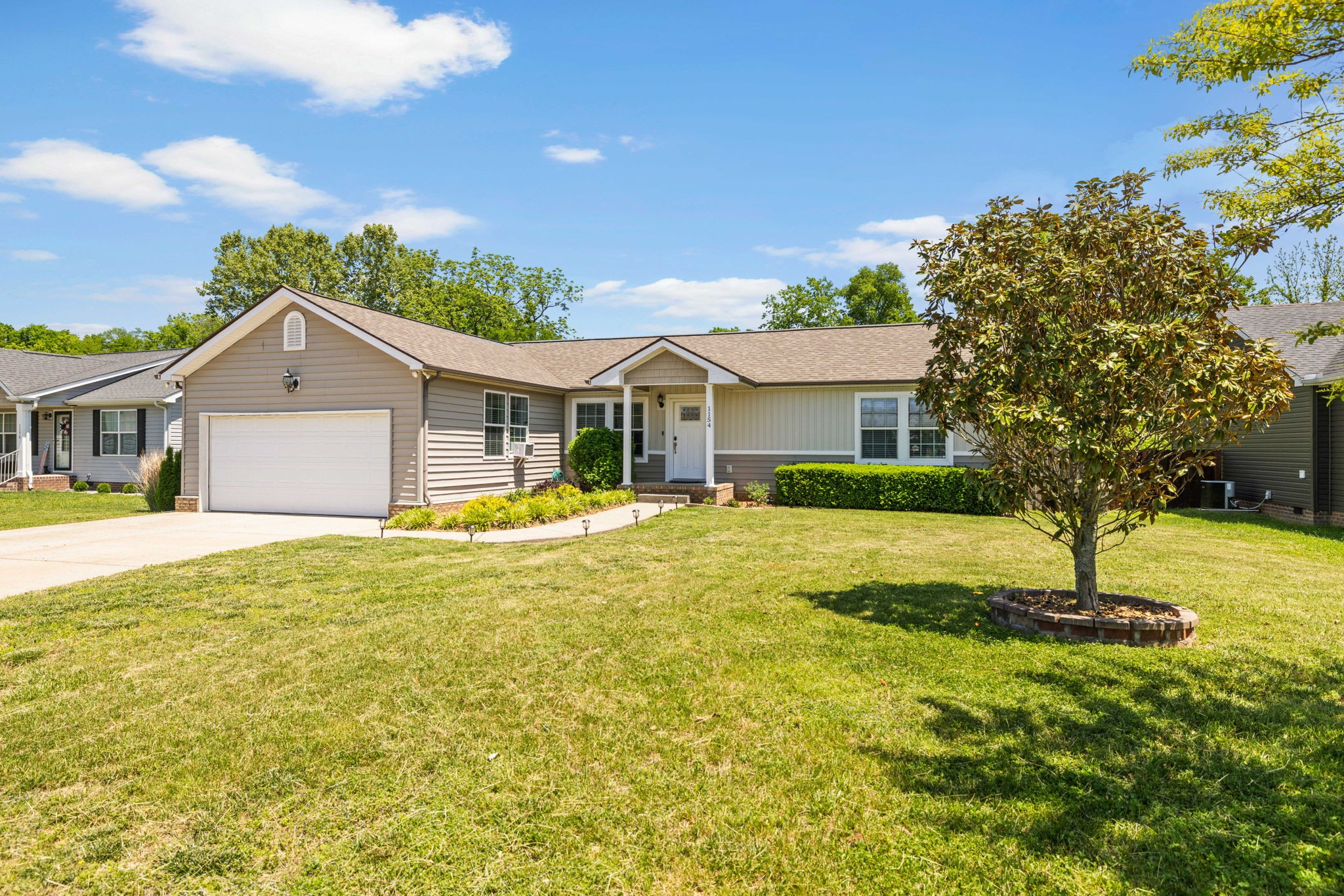1154 Wrights Mill Road Spring Hill, TN 37174 - Photo 31 of 38 a white house with a large pool