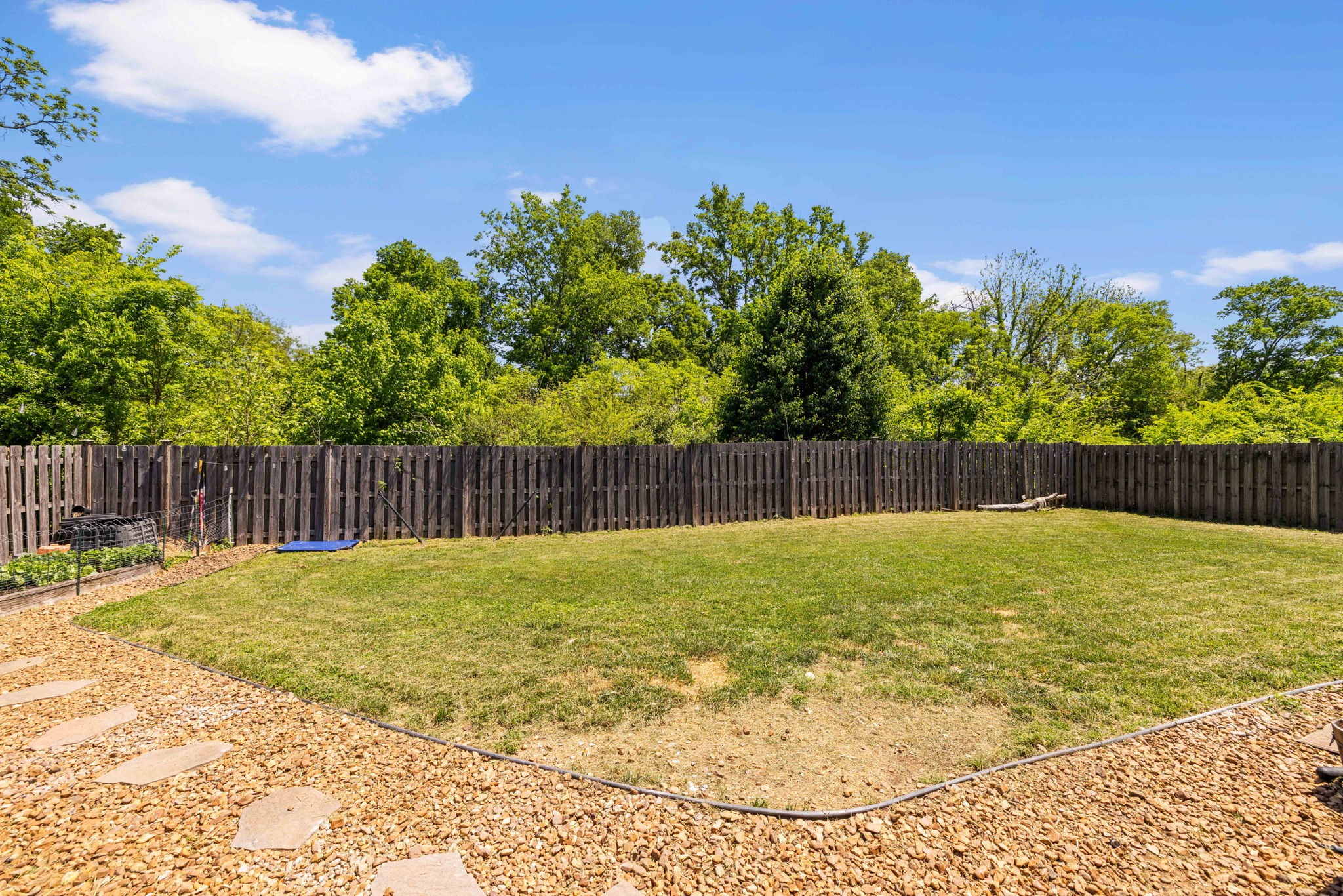 1154 Wrights Mill Road Spring Hill, TN 37174 - Photo 34 of 38 a swimming pool with trees in the background