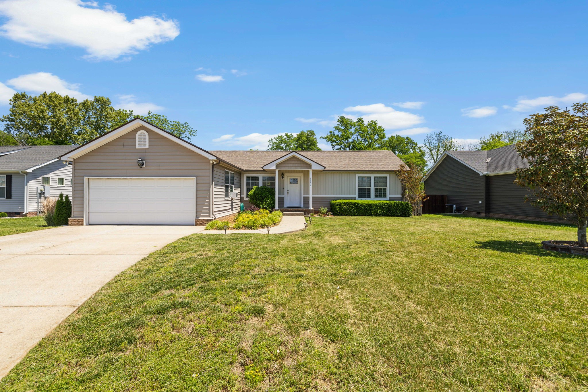 1154 Wrights Mill Road Spring Hill, TN 37174 - Photo 38 of 38 a front view of a house with a yard